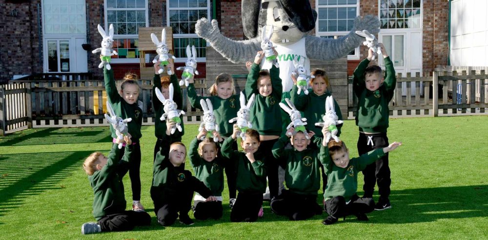 School children at Oakwood Primary School on their LazyLawn