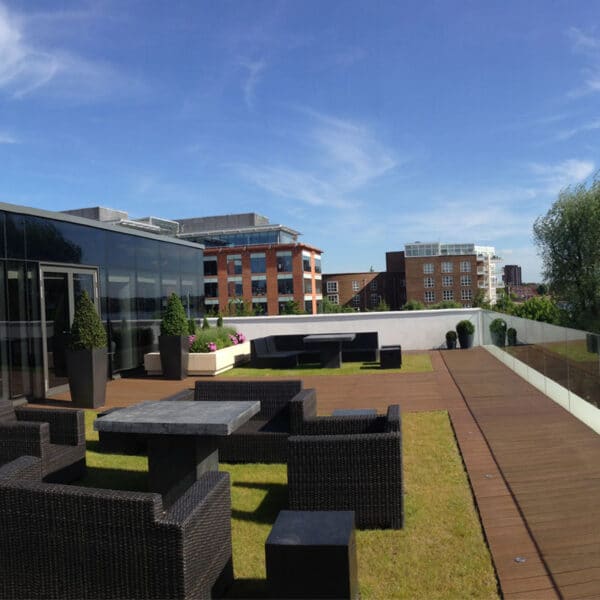 Millboard decking in coppered oak on a roof terrace