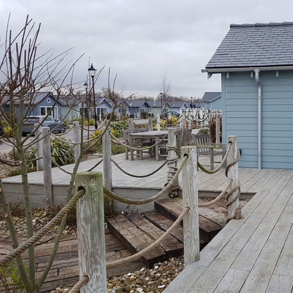Weathered oak millboard decking at Driftwood holiday park