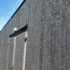Millboard cladding in embered