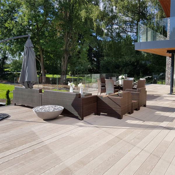 LazyLawn Enhanced Millboard decking Enhanced Grain in Limed Oak in a garden