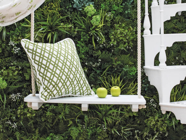 A picture of a swing in front of a VertEdge wall
