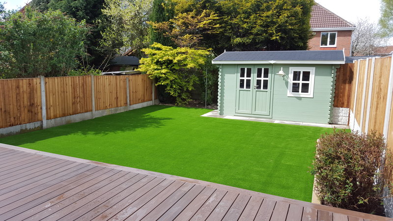 LazyLawn project in a garden with a shed
