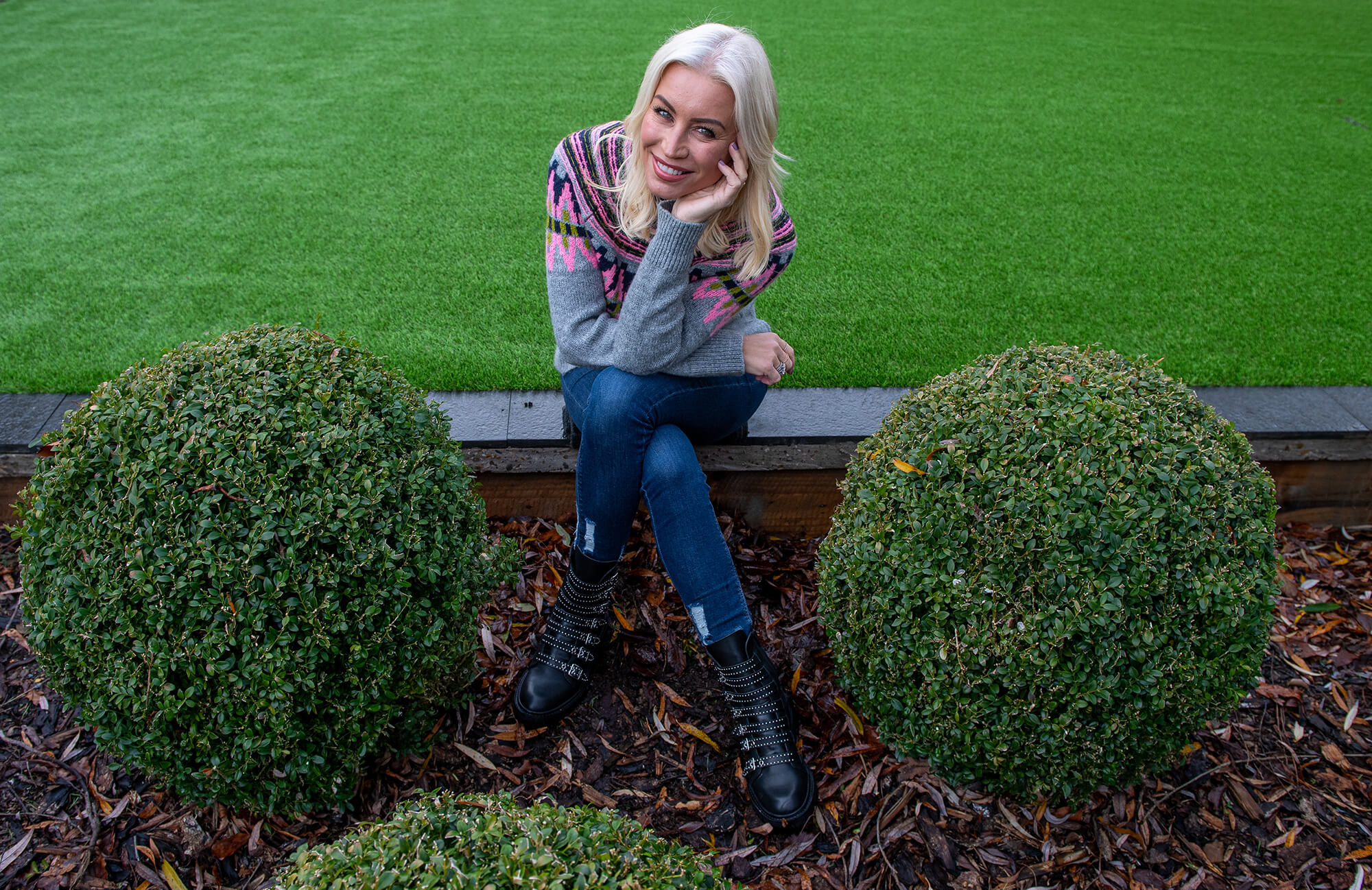 Picture of Denise Van Outen in front of artificial grass for the Big Essex Garden transformation