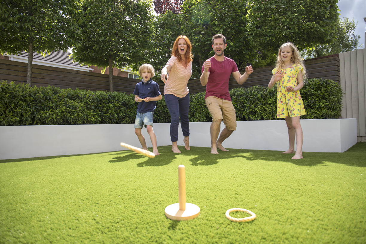 Family play ring toss on Artificial Lawn