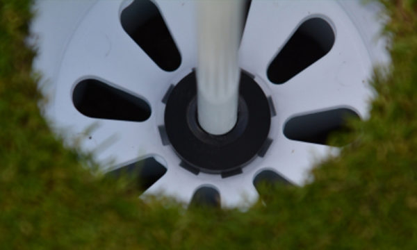 image of a white golf hole cup