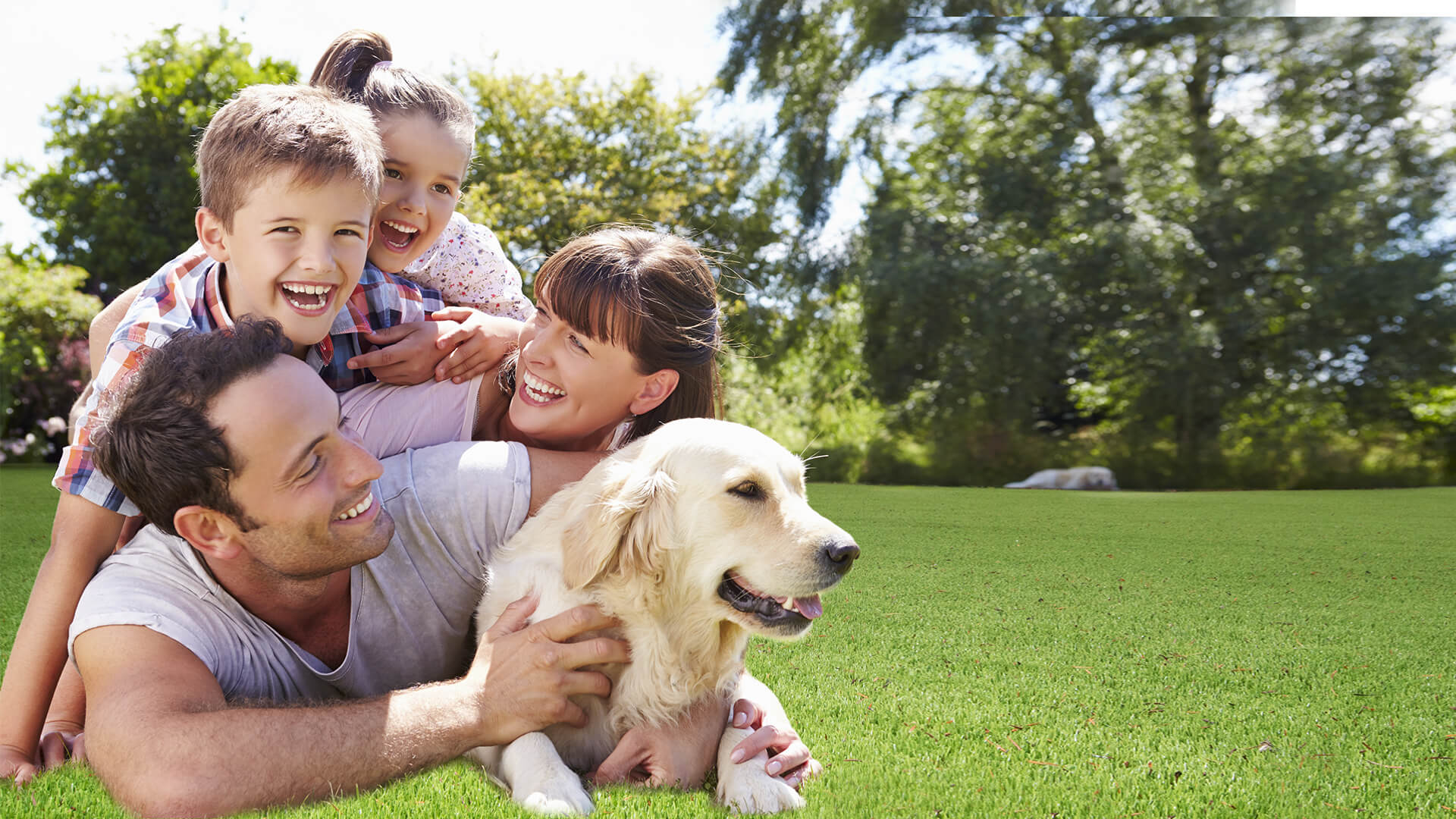 Family on LazyLawn Air artificial grass