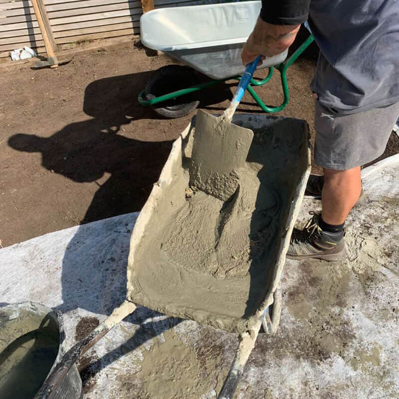 A wheelbarrow of cement