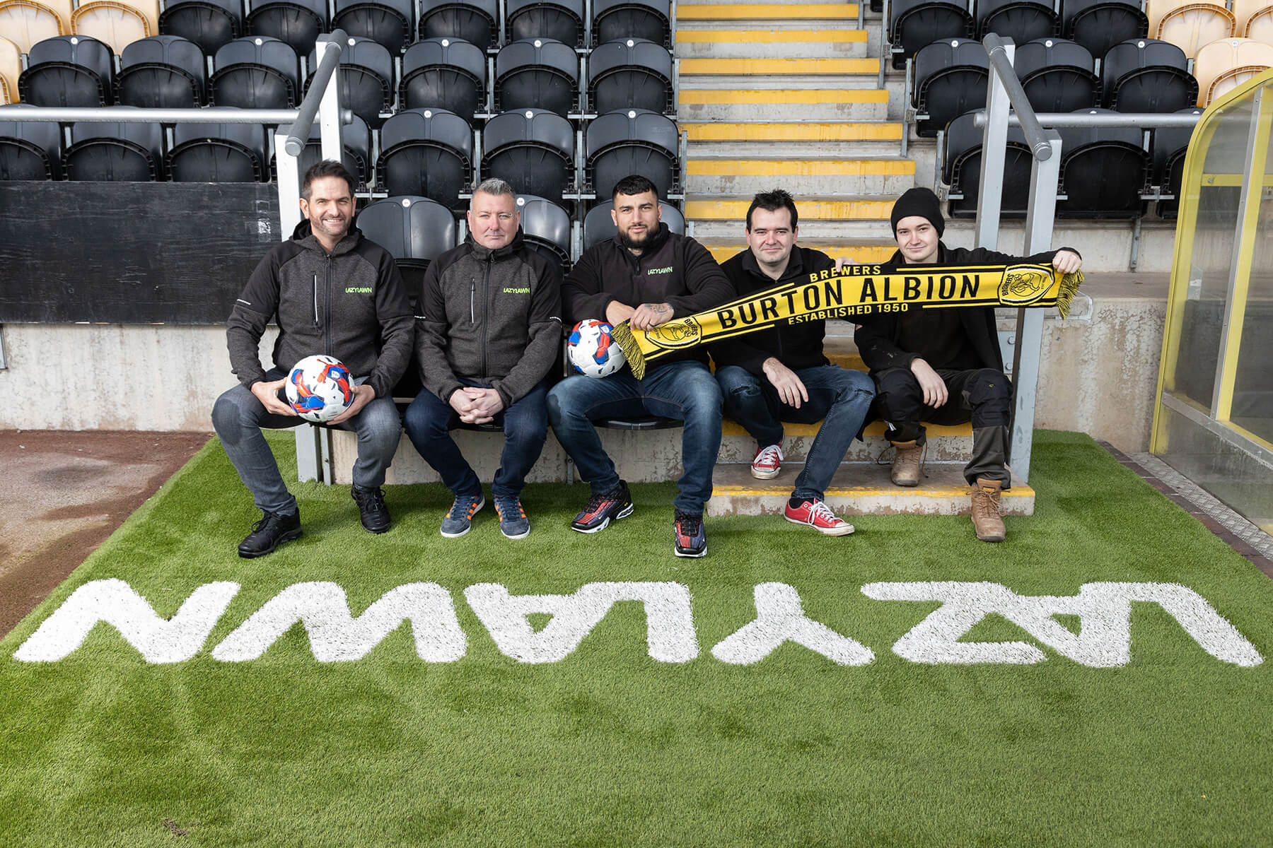 Image of the installation of artificial grass at Burton Albion's stadium