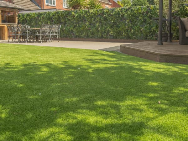 Image of artificial grass & millboard decking in a garden